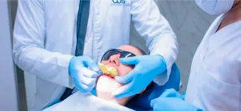 Step 6 of All-on-4 process in Mexico, focusing on the customization of dental crowns for a natural look.